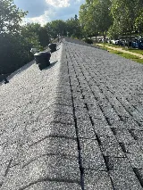 2 The Top Roofing Corp.